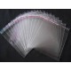 1 pack Plastik Tempat Baju Lipat ukuran 25 x 35 cm ada seal perekat